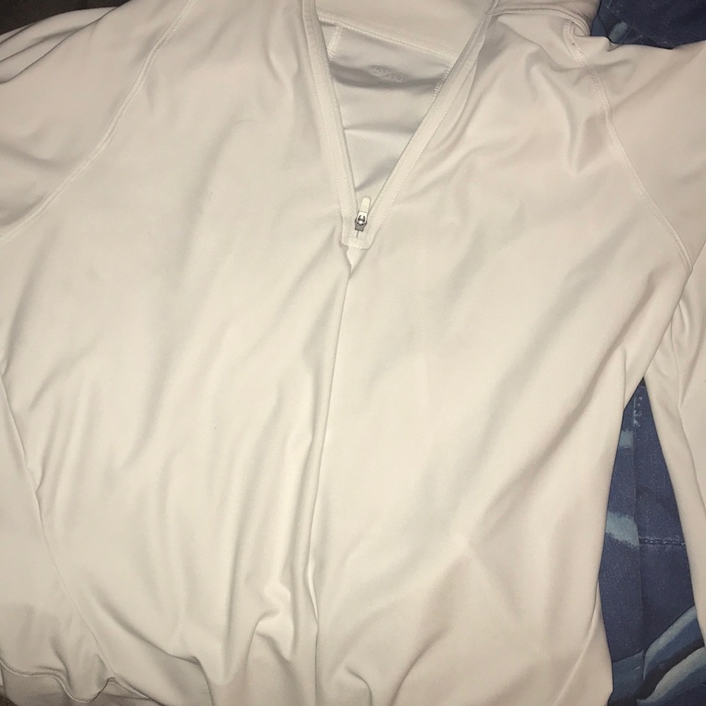 white half zip up jacket .